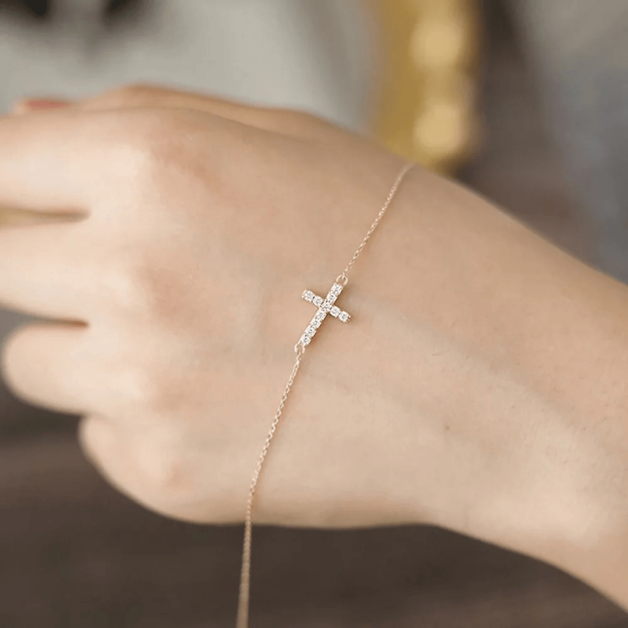 Sideways cross online bracelet gold